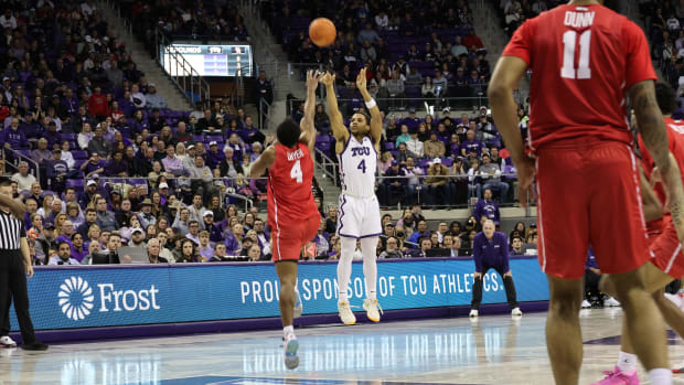 Jameer Nelson Jr. hits a three over Houston's LJ Cryer.